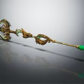 Ornate Golden Scepter With Dragon Carvings And Green Gemstone Accents