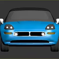 Shiny Blue Convertible Sports Car With Black Soft Top And Alloy Wheels