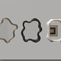 Three Different Shaped Mirrors With Brown Black And Beige Frames On White Wall