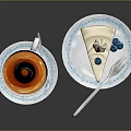 White Teacup With Blue Floral Pattern And Layered Cream Cake With Blue Decorations On Saucers