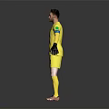Football Goalkeeper in Yellow Jersey Number 1 with Black Gloves and Armband Standing Pose