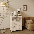 White Decorative Cabinet With Drawers Coffee Machine Vase Floor Lamp Plant And Cozy Sofa
