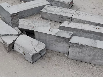 Broken Concrete Blocks Scattered On Ground With Cracks And Metal Fasteners 3d model
