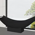 Modern Black Curved Bathtub In Bright Bathroom With Window And Green Plants
