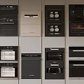 Stylish Kitchen Appliances With Various Built In Ovens And Microwaves Arranged In Wall Cabinets