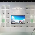 Modern Public Office Space With Broadcast Desk HNlive Logo Hexagonal Backdrop And Professional Lighting