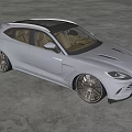 Modern Gray Sports Car With Stylish Black Rims And Sleek Exterior In Showroom Setting