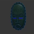 Green Decorative Mask With Textured Surface And Blue Eyes Serrated Edges