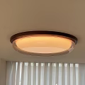 Modern Round Ceiling Light with Wooden Frame and White Lampshade Emitting Soft Light Ceiling Mounted