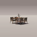 Wooden Dining Table With Four Chairs Plant In Vase And Oranges On Tabletop