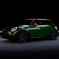 Green MINI Stylish Compact Car With Red Roof And Black Alloy Wheels