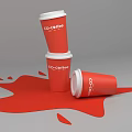 Red CO COFFEE Paper Cups Stacked Two And Spilled One With Liquid Stain