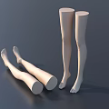 Model Mannequin Legs And Feet In Standing And Lying Positions On Dark Surface