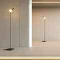 Modern Minimalist Floor Lamps With Black Pole And White Shade Illuminating Simple Indoor Setting