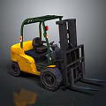 Yellow Forklift With Green Overhead Frame Black Forks And Driver Seat