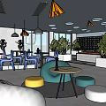 Modern Casual Lounge Area With Blue Chairs Round Tables Green Plants And Colorful Ottomans