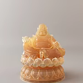 Amber Colored Laughing Buddha Sculpture With Hand Carved Lotus Base