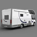 White RV Motorhome With Blue Accent Stripes And Roof Windows Exterior Design
