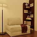 Upholstered Beige Single Sofa With Brown Blanket Floor Lamp And Wooden Bookshelf