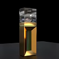 Modern Golden Decorative Display Case With Transparent Glass Cover And Small White Object Inside