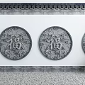 Traditional Chinese Building Exterior Wall With Gray Stone Circular Fu Characters Reliefs And Green Plants