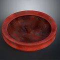 Red Circular Sculpture Carving With Textured Surface And Dark Background 3d model