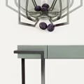 Modern Console Table With Glass Top Metal Frame Lamp And Artwork