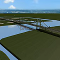 Green Cable Stayed Bridge Over River With Scenic Grassland And Blue Sky