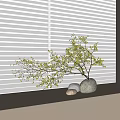 Natural Decorative Arrangement On Window Sill With Stone Vase Twigs And Small Stones Against Blinds
