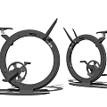 Two Modern Black Circular Fitness Exercise Equipment With Seats And Pedals