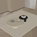 Modern White And Black Coffee Tables On Beige Rug With Book Cup Box And Bowl
