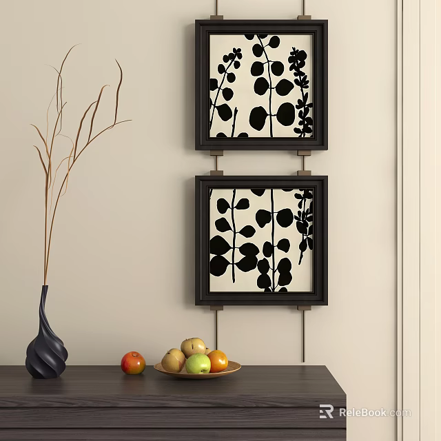 Abstract Paintings in Black Frames with Leaf Patterns by Vase and Fruit on Light Wall 3d model