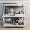 White Multi tiered Side Table With Open Shelves Books Decorative Items And Potted Plant