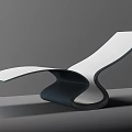 Modern Lounge Chair With Curved White Seat And Dark Supportive Frame