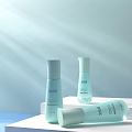 Light Blue Skincare Cosmetics With Minimalist Bottles And Soft Light Background