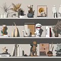 Stylish Decorative Ornament Combinations With Sculptures Vases Books Framed Art And Figurines On Multiple Shelves