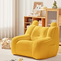Cozy Yellow Abstract Sofa in Living Room with Stuffed Toys Wooden Bookshelf and Table Lamp