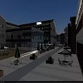 Modern Traditional Commercial Street With Glass Facade Stone Buildings Outdoor Seating And Pedestrian Areas