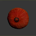 Round Red Textured Pumpkin On Shiny Dark Background With Smooth Surface
