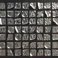 Metallic Wall Decor with Irregular Shapes Arranged in Grid Pattern for Modern Interior 3d model