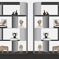 Modern Bookshelf Design With Multiple Decorative Shelves Displaying Sculptures And Books
