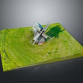 Miniature Windmill Model On Green Grass Base With Wooden Sails