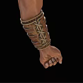 Detailed Leather Bracer With Metal Buckles On Clenched Fist Against Black Background