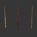 Three Wooden Magic Wands With Carved Designs And Decorative Handles