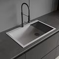 Modern Kitchen Sink With Black Curved Faucet Stainless Steel On Dark Countertop And Drainage Grill