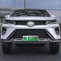 White Toyota SUV Featuring Modern Front Grille And Sleek Body Design