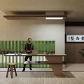 Japanese Style Reception Desk Interior With Laptop Mug Wooden Slat Partition And Bookshelves Calligraphy Artwork