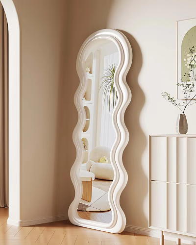 Stylish Wave Shaped Mirror In Light Beige Room With White Cabinet And Potted Plant 3d model