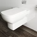 White Toilet With Open Lid Toilet Paper Holder And Brush On Wooden Floor