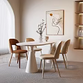 Modern White Round Dining Table Set With Beige Brown Upholstered Chairs Green Plant Artwork Bookshelf